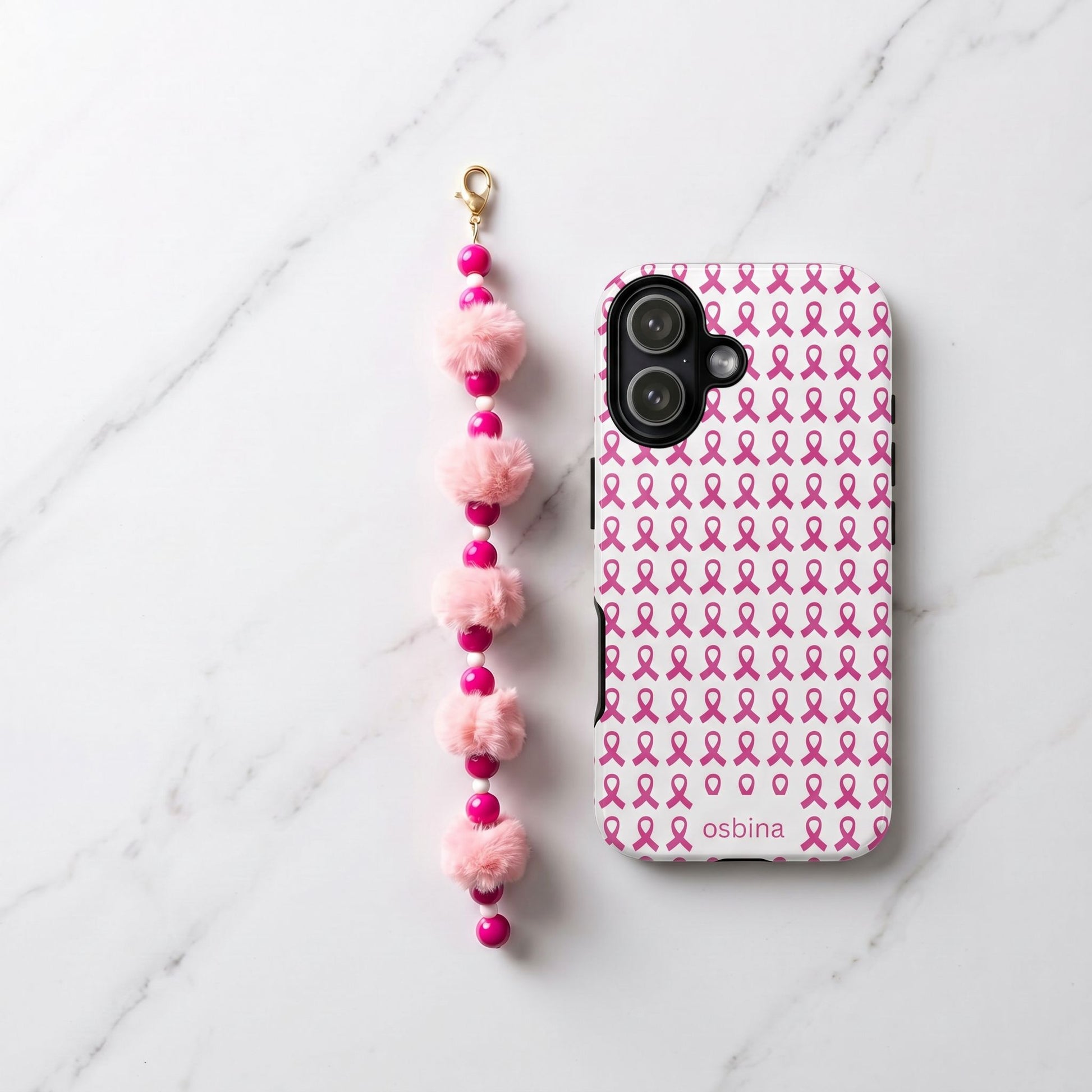 The Pink Ribbon Cloud Charm by osbina alongside YAYOU Ribbon case on marble flatlay